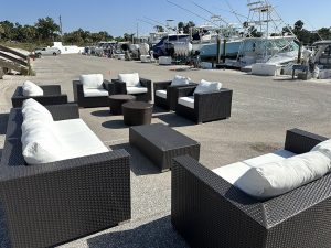 Luxury event furniture rental in Tampa featuring modern white sofas and LED glow seating for corporate and wedding events