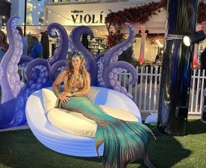 luxury event lounge furniture setup in Florida with VIP seating and glow elements