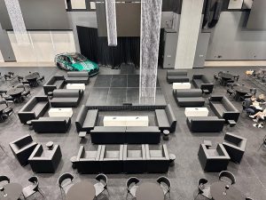 Black leather VIP furniture rental setup for a luxury corporate event in Tampa, Florida